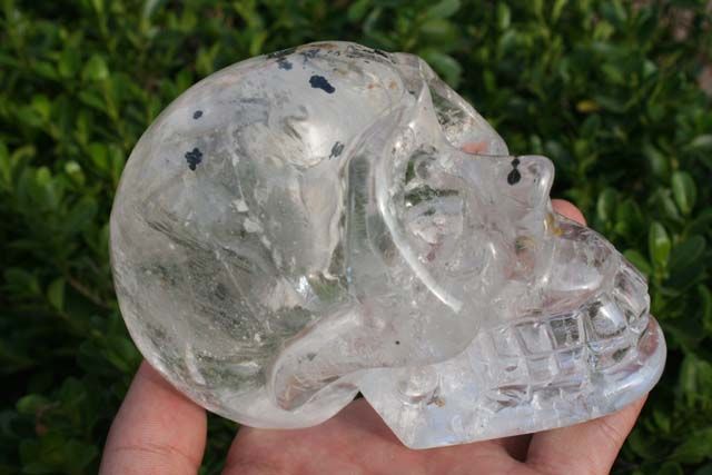 Clear Quartz Rock Crystal Skull Carving black substance  