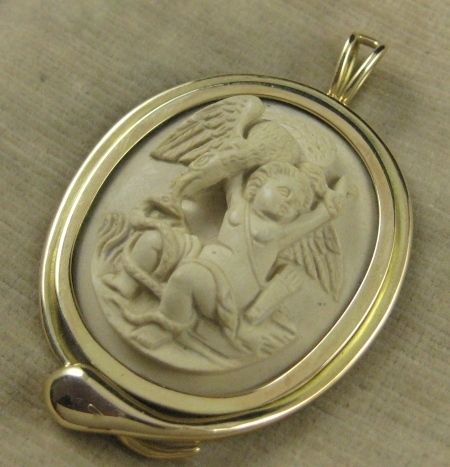 VICTORIAN VOLCANIC LAVA CHERUB/ HEBE SERPENT GOLD PENDT  