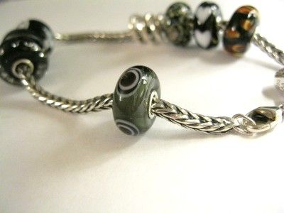   TROLLBEADS 7 1/2 BRACELET & 7 GLASS BEADS & SILVER 3 SIBLINGS CHARM