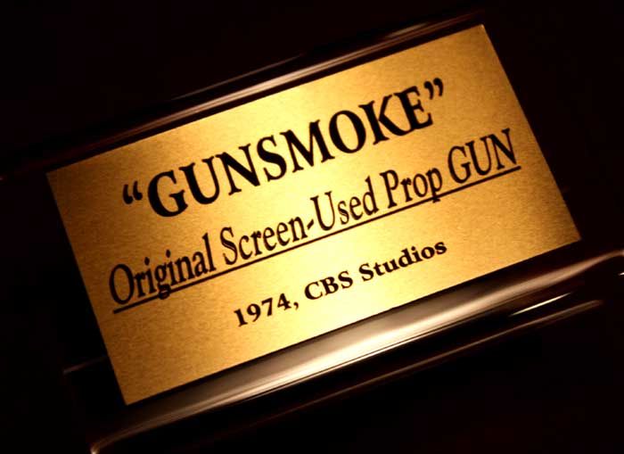 The Prop Gun comes with a plexiglass DISPLAY STAND and this engraved 