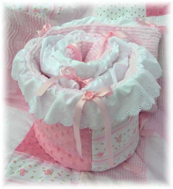 Crib skirt is 2 tier with white eyelet over pink gingham and finished 